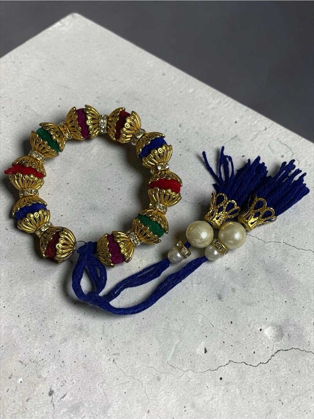 South Asian-Inspired Multicolor Bead Bracelet with Faux Pearls & Tassel Closure